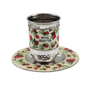 Metal Kiddush Cup with Pomegranate Design on a Light Background