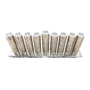 Menorah made of silver metal tubes wrapped with copper-colored pomegranate metal cutouts