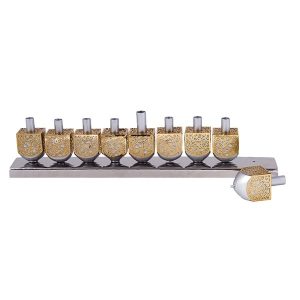 Unique Menorah of Dreidels Decorated with Gold Cutout Patterns