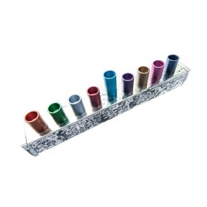 Small Menorah made of a hammered metal strip with colorful reeds