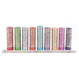 Menorah of colorful metal tubes wrapped with metal pomegranate cutouts